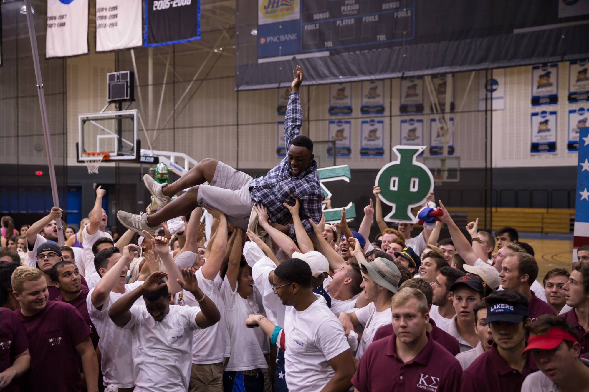 A student crowd surfing at IFC Bid Day